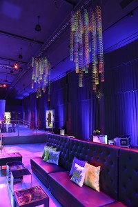 couch area of neon themed party room