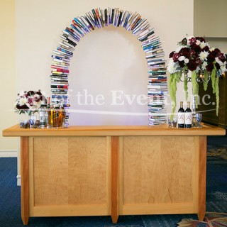 bar with book archway behind it
