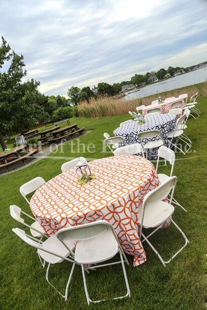 Round Tables with Blue and Orange tablecloths